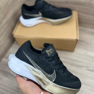 NIKE W ZOOMX VAPORFLY NEGRO ORO