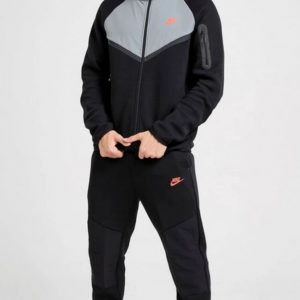 CHANDAL NIKE TECH 2026 NEGRO GRIS LOGO NARANJA