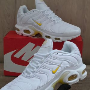 TN BLANCA LOGO AMARILLO